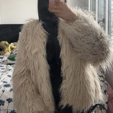 Veste en fausse fourrure beige