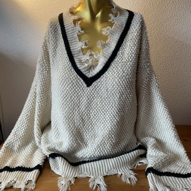 Pull franges style grunge