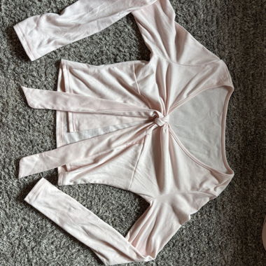 Haut portefeuille rose