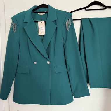Women’s green suit