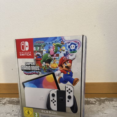 Nintendo Switch OLED & 12 Monate Nintendo Online 