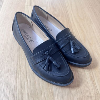 Schwarze Tassel-Loafer