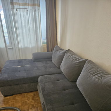 Damaged Grey Sofa