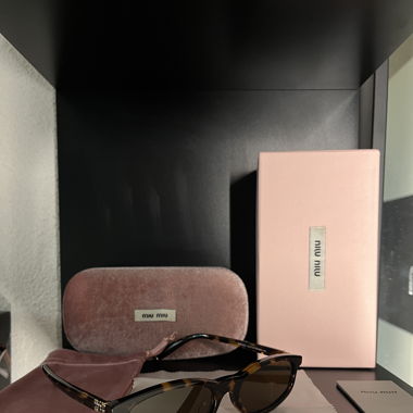 MiuMiu Sonnenbrille 
