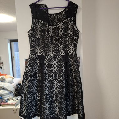 Sleeveless black lace dress