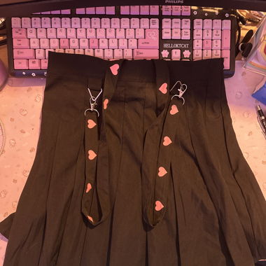 Black skirt with heart suspenders 