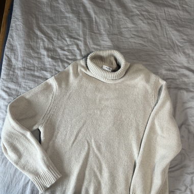 Pull col roulé