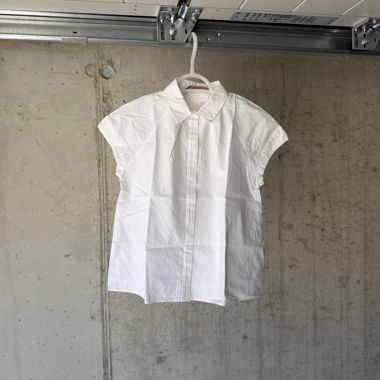 White Sleeveless Shirt