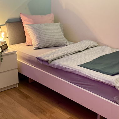 Letto con rete a doghe e materasso