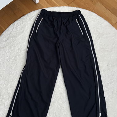 Pantalon de sport/city sombre bleu foncé avec fermetures éclair