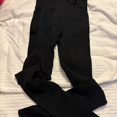 Leggings neri con motivo floreale