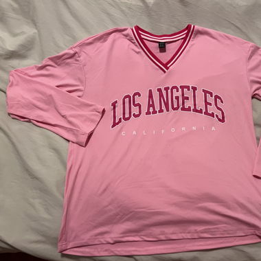 Pull rose style américain 