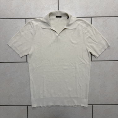 Polo in maglia bianca