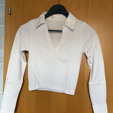 Top manica lunga con colletto polo