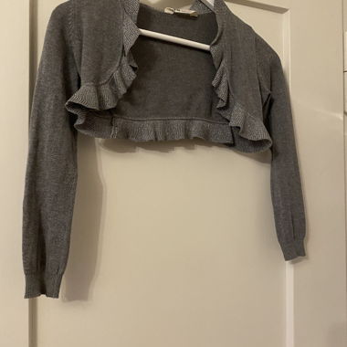 Bolero grigio con extra