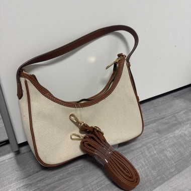 Sac à main beige en toile avec détails marron