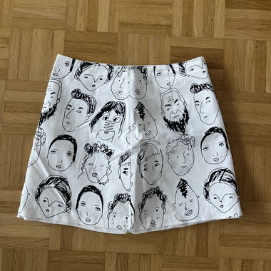 White Skirt with Face Print