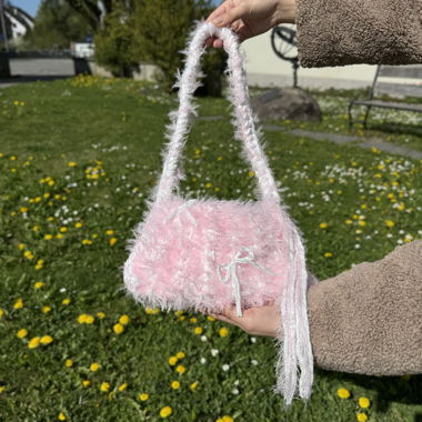 Borsa rosa soffice all'uncinetto fatta a mano