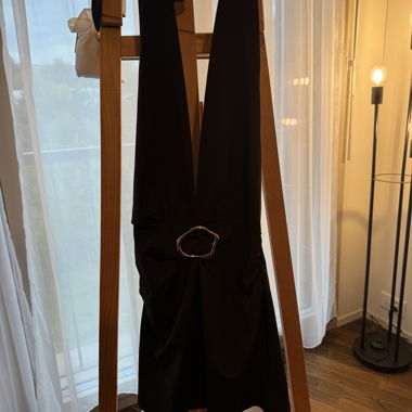 Black dress with deep neckline