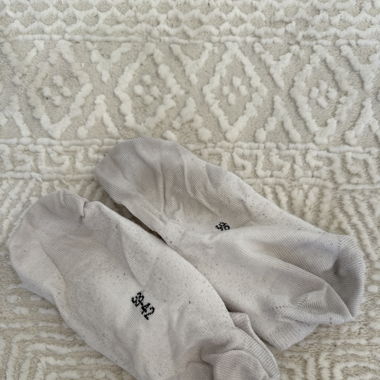 Getragene Puma Socken