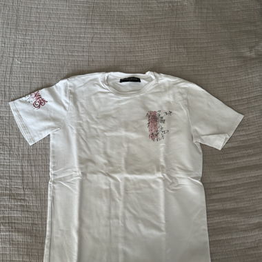 T-shirt bianca con stampa Manière de Voir S
