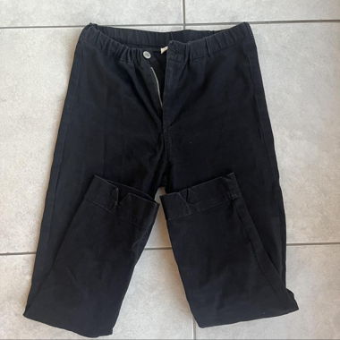 Black casual pants with slit hem