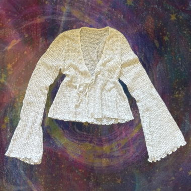 Top in maglia bianco con maniche larghe