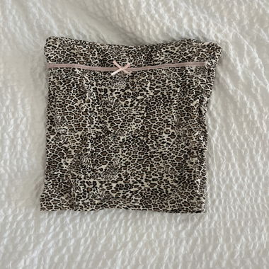 Top a fascia stampa leopardo
