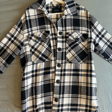 Veste mi-saison à carreaux noir et blanc