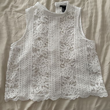 Top senza maniche in pizzo Forever 21