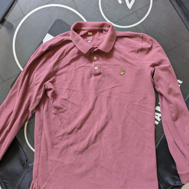 Polo rosa a maniche lunghe