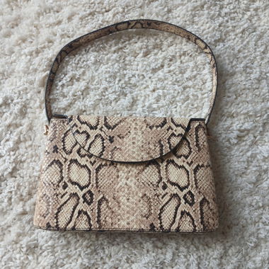 Handtasche mit Schlangenmuster