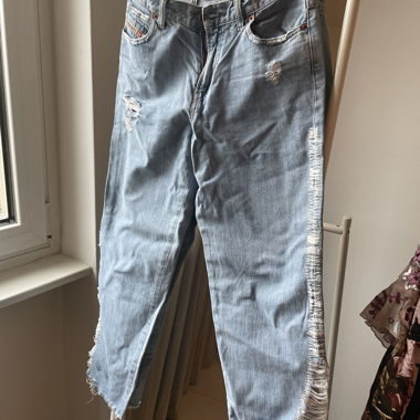Jeans diesel con strappi 