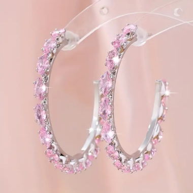 Orecchini a cerchio d'argento con pietre rosa