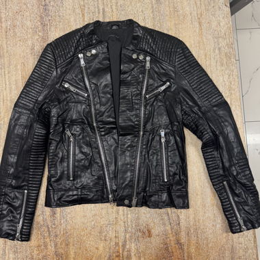 Black faux leather jacket with zippers