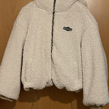 Wendbare Steppjacke mit Teddyfutter