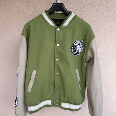 Green Varsity Jacket Editorial Department