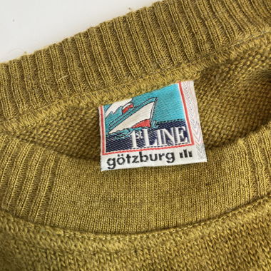 Maglione giallo senape a motivo