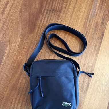 Lacoste Bauchtausche
