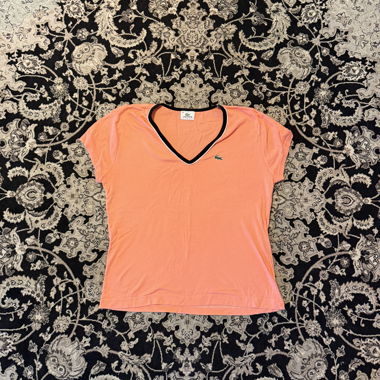 Top Lacoste Sport con scollo a V
