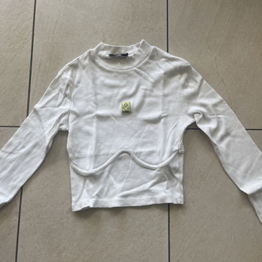 Top corto bianco a maniche lunghe