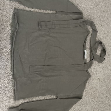 greenish grey jumper 