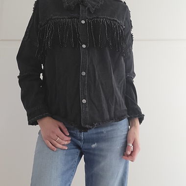 Veste noire à franges
