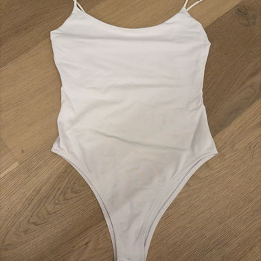 White spaghetti strap bodysuit