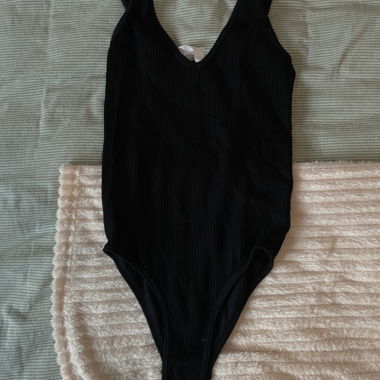 Schwarzer, gerippter Body, Einheitsgrösse