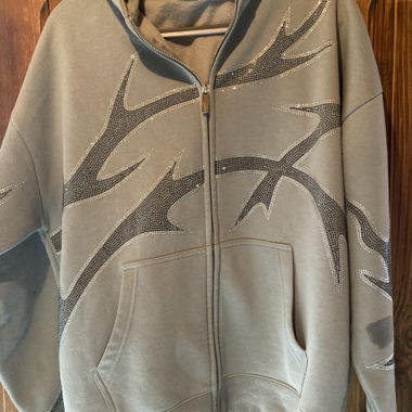 Felpa grigia con zip e cappuccio