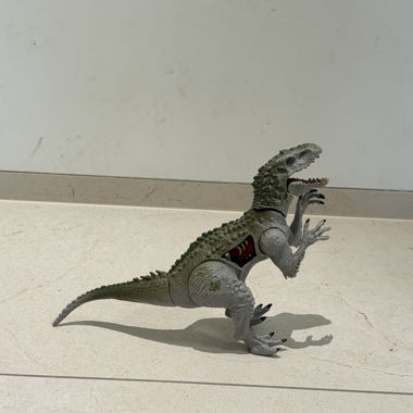 Dinosaurier-Spielzeugfigur grau