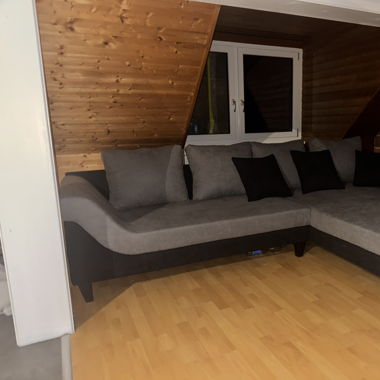 Grau schwarze Eck couch