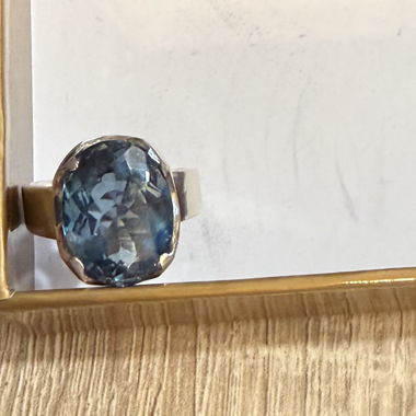 Silver ring with topaz