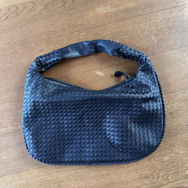 Braided black baguette bag